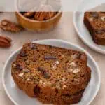 White plates, each holding slices of date nut bread. Text overlay includes recipe name.