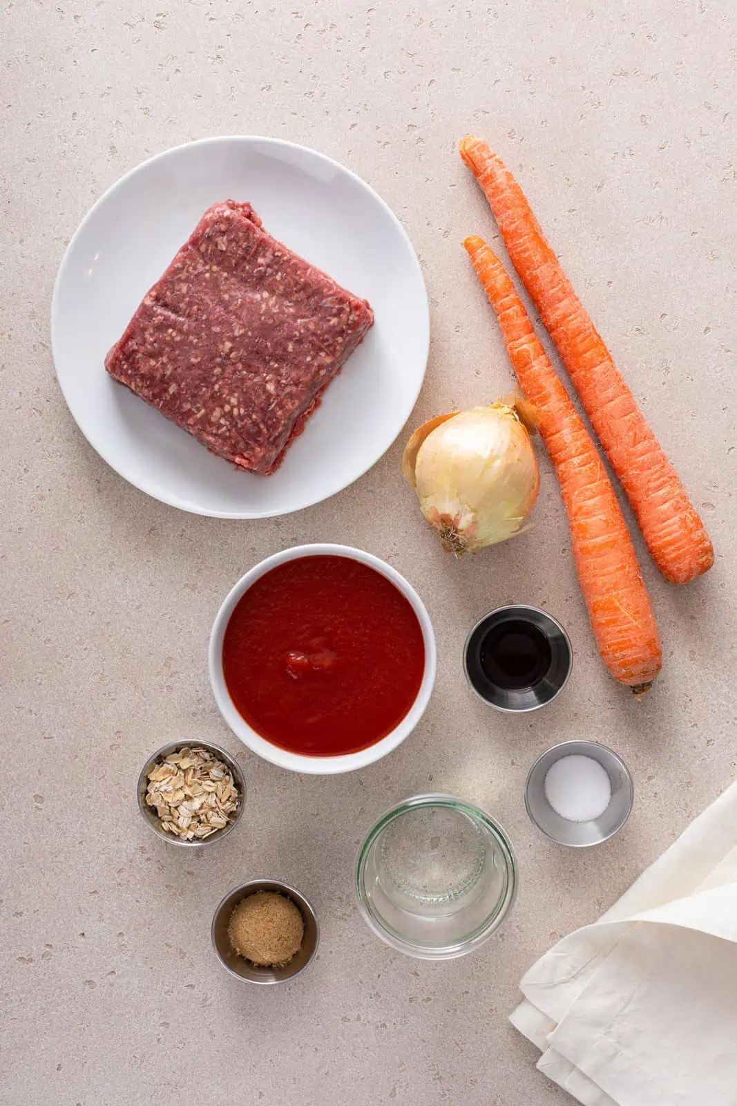 Ingredients for sloppy joes arranged on a countertop.