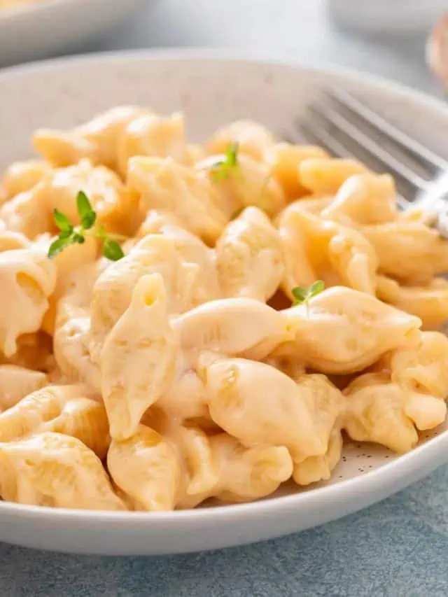 Close up of a bowl filled with homemade shells and cheese.