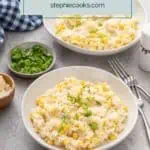 Two white bowls, each filled with sweet corn risotto and garnished with green onion. Text overlay includes recipe name.