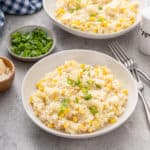 White bowl filled with sweet corn risotto.