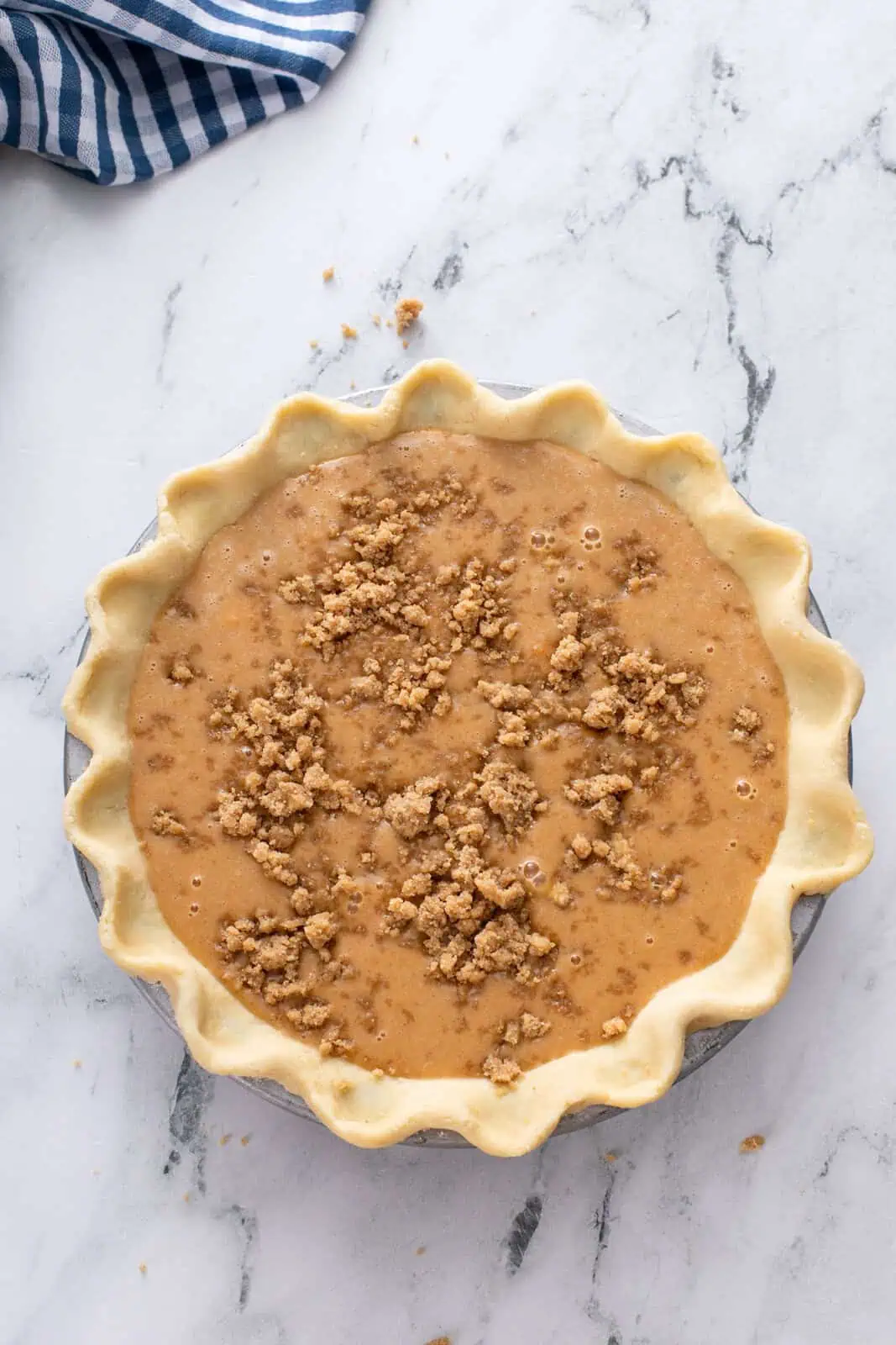 Assembled sweet potato pie ready to go in the oven.