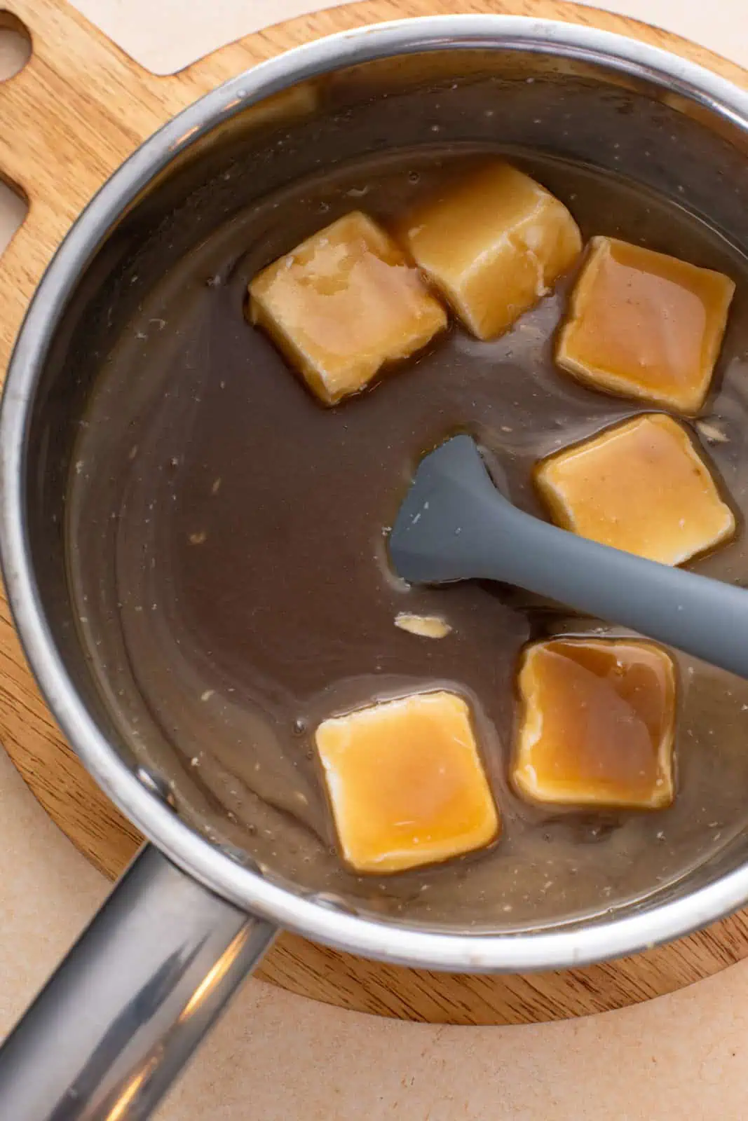 brown sugar and butter melting in a saucepan.