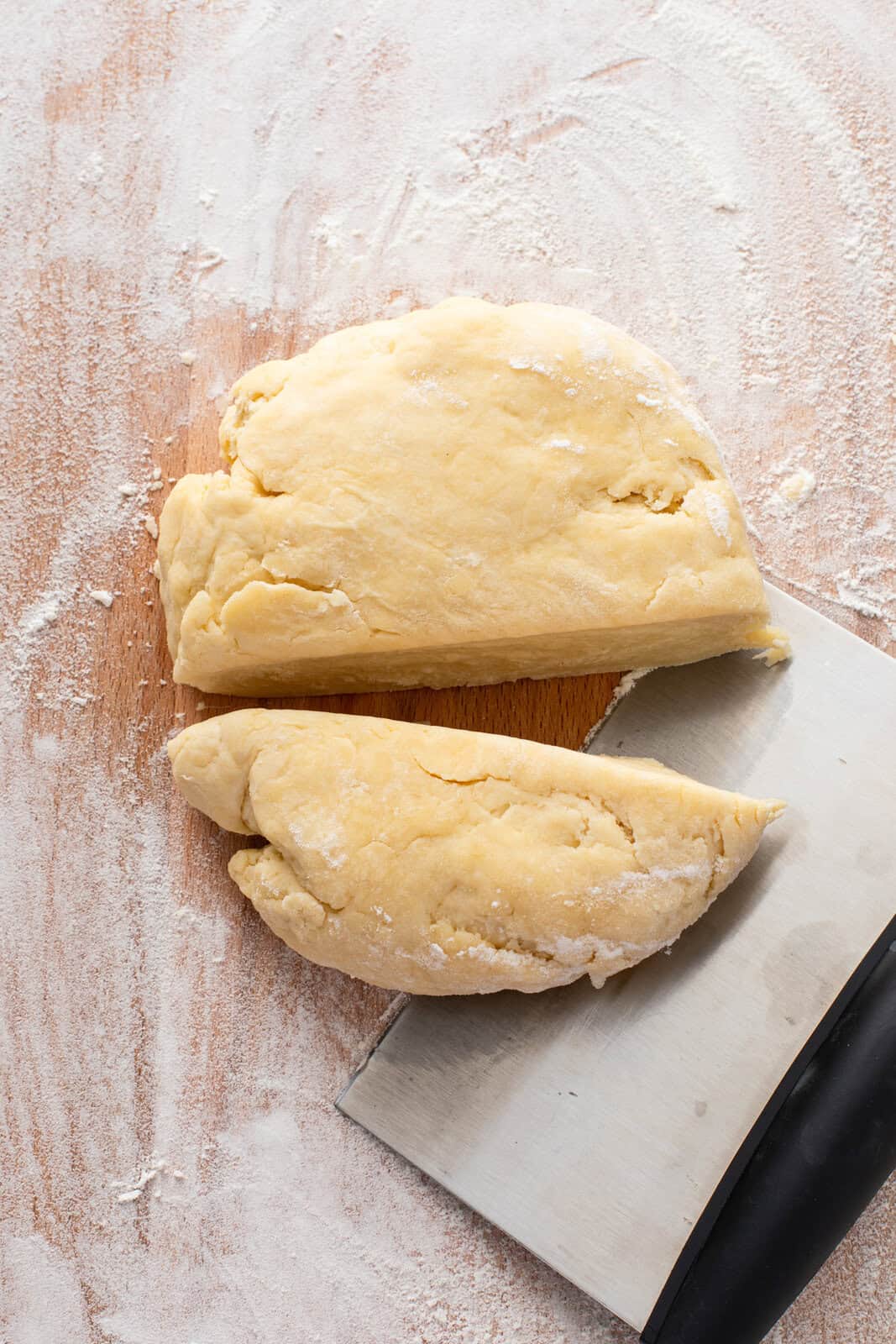 Kneaded dough for cobbler pastry cut into two pieces.