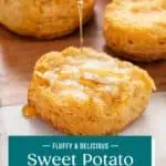 Hand drizzling honey over half of a sweet potato biscuit. Text overlay includes recipe name.