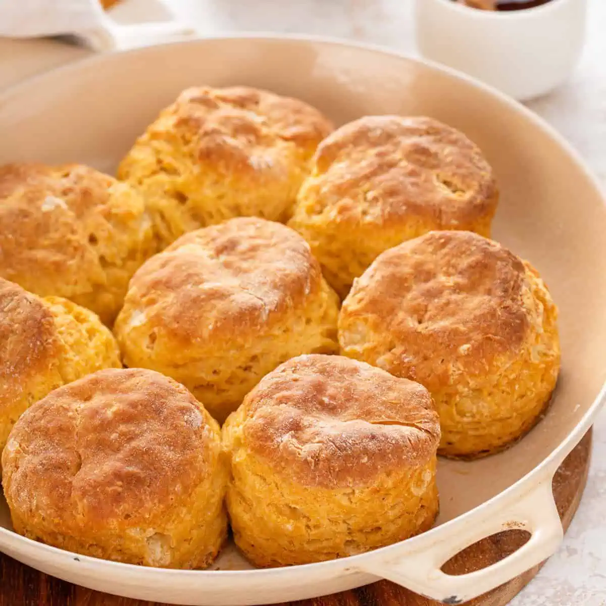 Close up of baked sweet potato biscuits in a skillet.