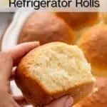 Hand holding up a refrigerator roll with the pan of rolls in the background. Text overlay includes recipe name.