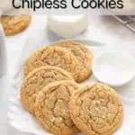 Several chocolate chipless cookies arranged on a plate lined with a piece of parchment paper. Text overlay includes recipe name.