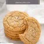 Stack of chocolate chipless cookies next to a glass of milk with a cookie with a bite taken from it leaning against the stack. Text overlay includes recipe name.