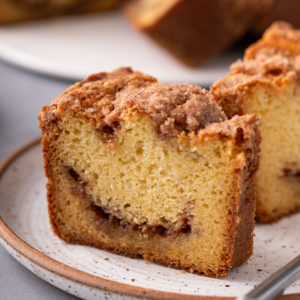 Close up of plated slice of sour cream coffee cake.