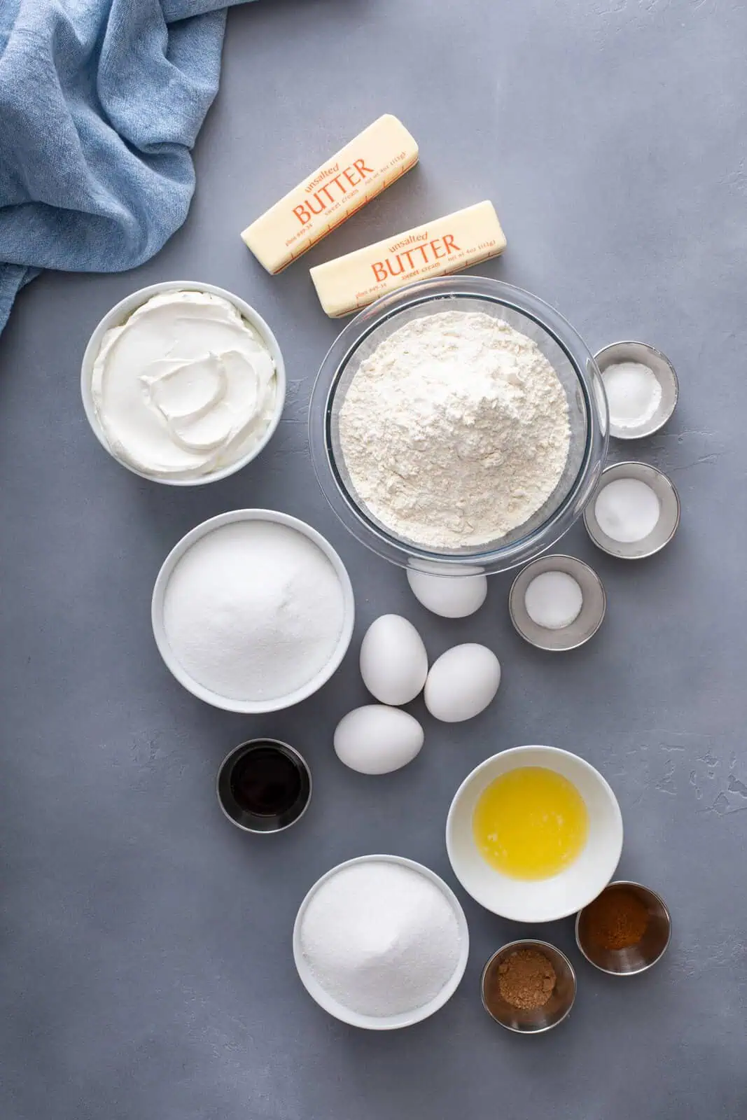 Ingredients for sour cream coffee cake arranged on countertop.